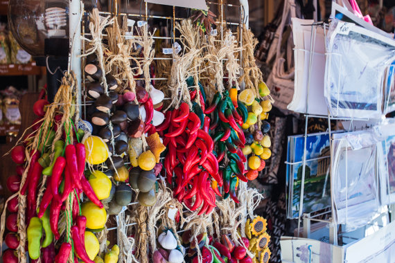 Bright colors abound in this Italian tourism shop.