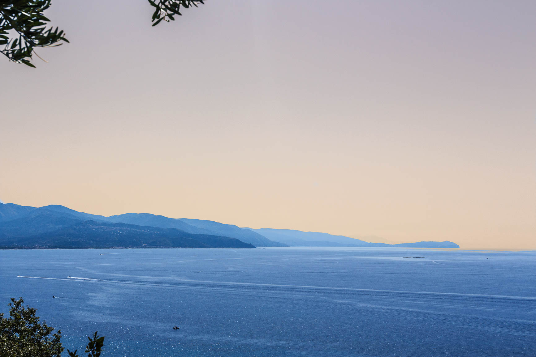 Sunset begins to take hold on the coast of Italy.